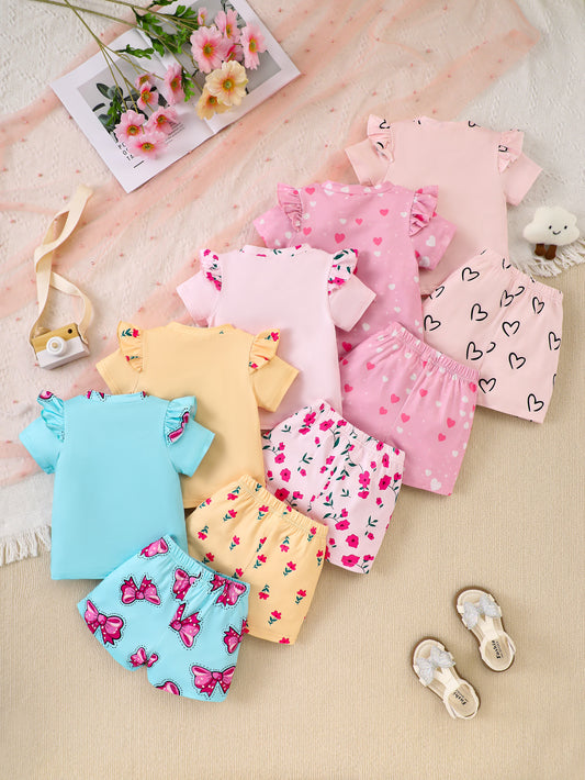 10-Piece Baby Girl Casual Elephant Print Flutter Sleeve Short-Sleeve Top and Shorts Set, made from soft and comfortable knit fabric.