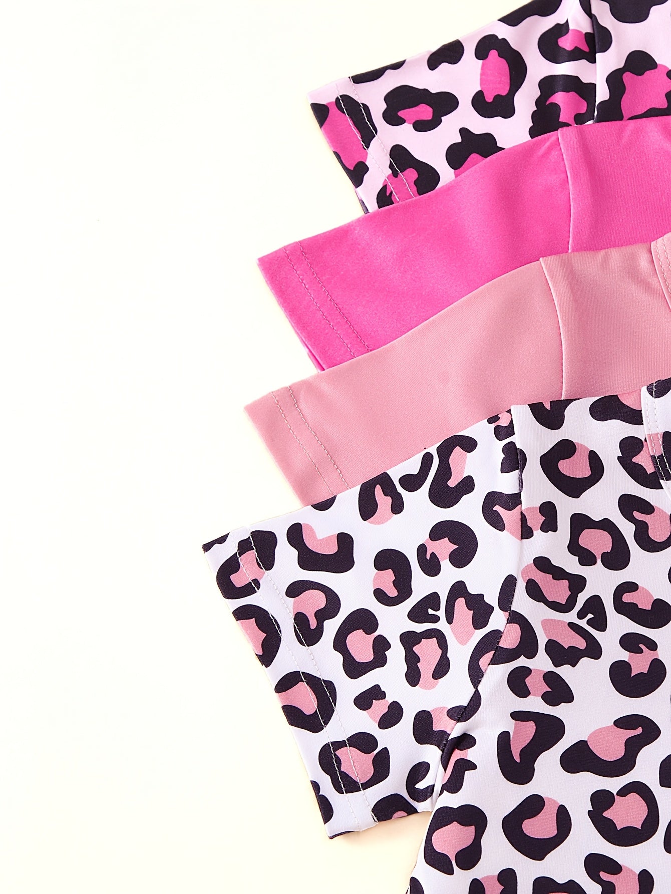 8-Pack Girls' Leopard Print Short Sleeve Top and Shorts Set, featuring a casual and stylish design perfect for outdoor activities in spring and summer.