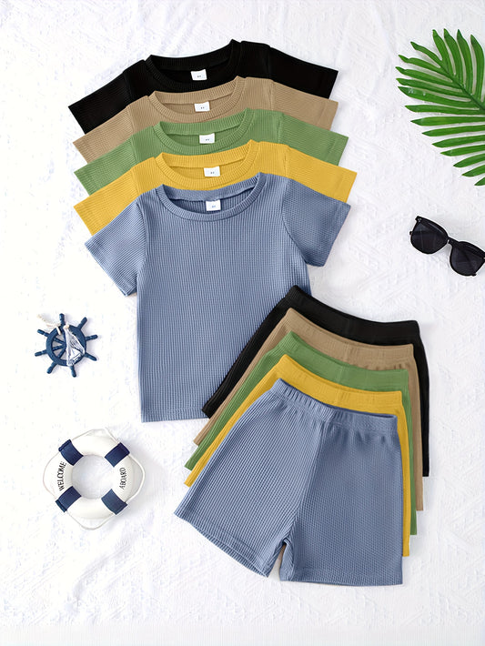 10-Piece Boys' Solid Color Casual Waffle Knit Short Sleeve and Shorts Set, made from soft and comfortable fabric.