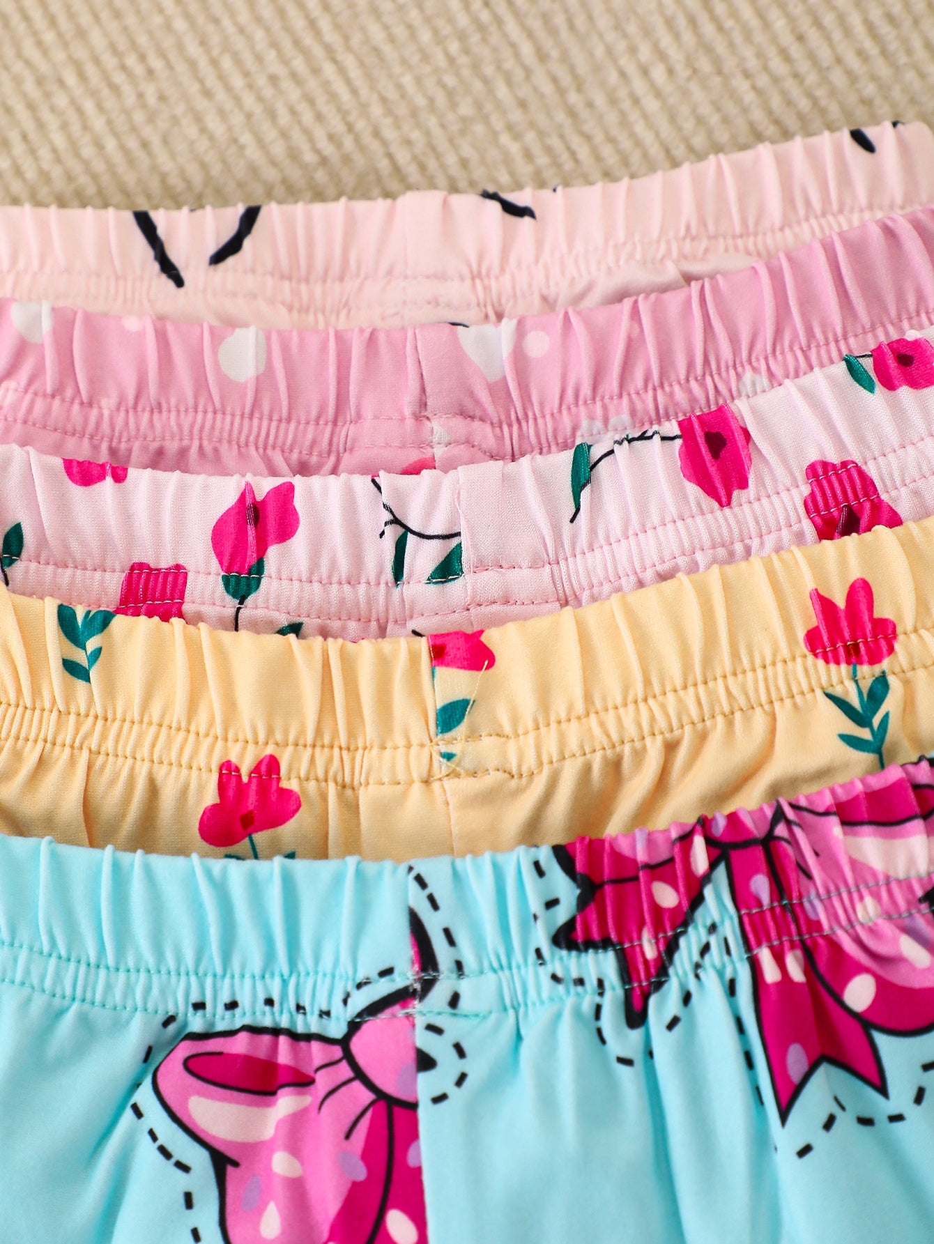 10-Piece Baby Girl Casual Elephant Print Flutter Sleeve Short-Sleeve Top and Shorts Set, made from soft and comfortable knit fabric.