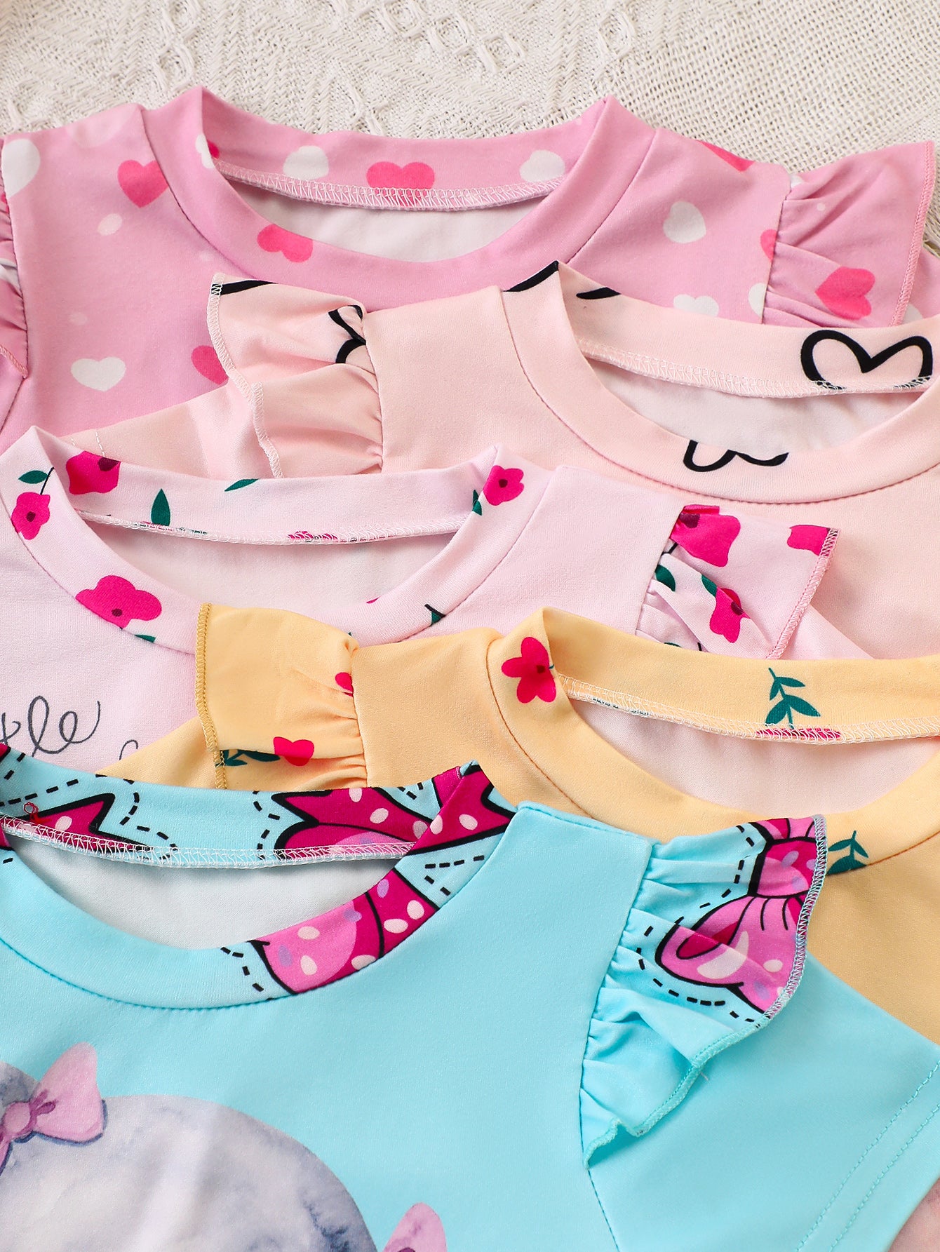 10-Piece Baby Girl Casual Elephant Print Flutter Sleeve Short-Sleeve Top and Shorts Set, made from soft and comfortable knit fabric.