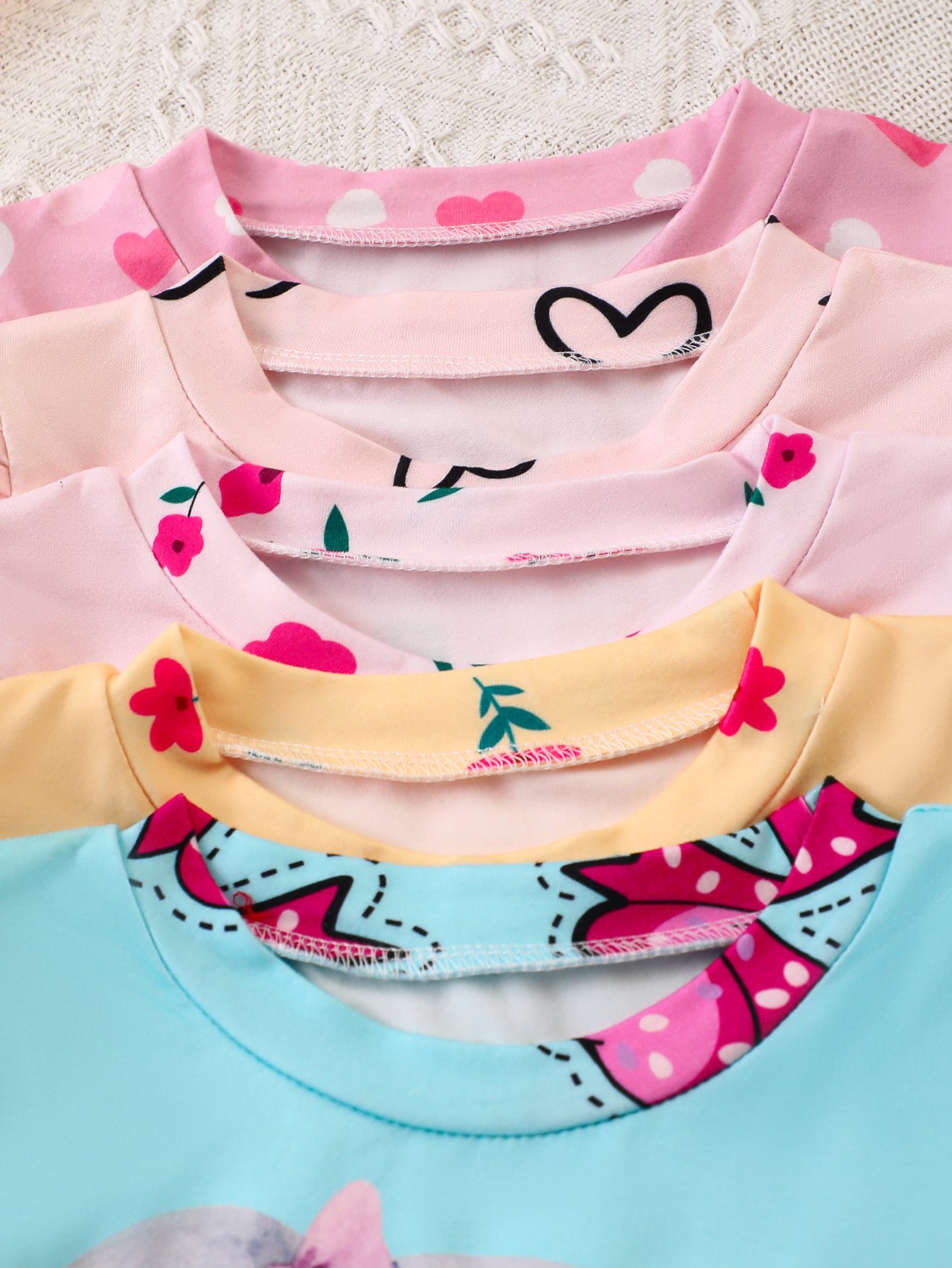 10-Piece Baby Girl Casual Elephant Print Flutter Sleeve Short-Sleeve Top and Shorts Set, made from soft and comfortable knit fabric.