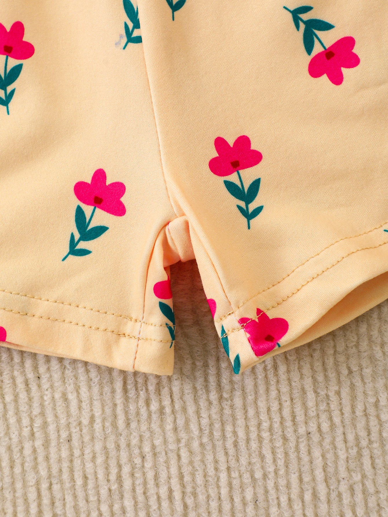 10-Piece Baby Girl Casual Elephant Print Flutter Sleeve Short-Sleeve Top and Shorts Set, made from soft and comfortable knit fabric.